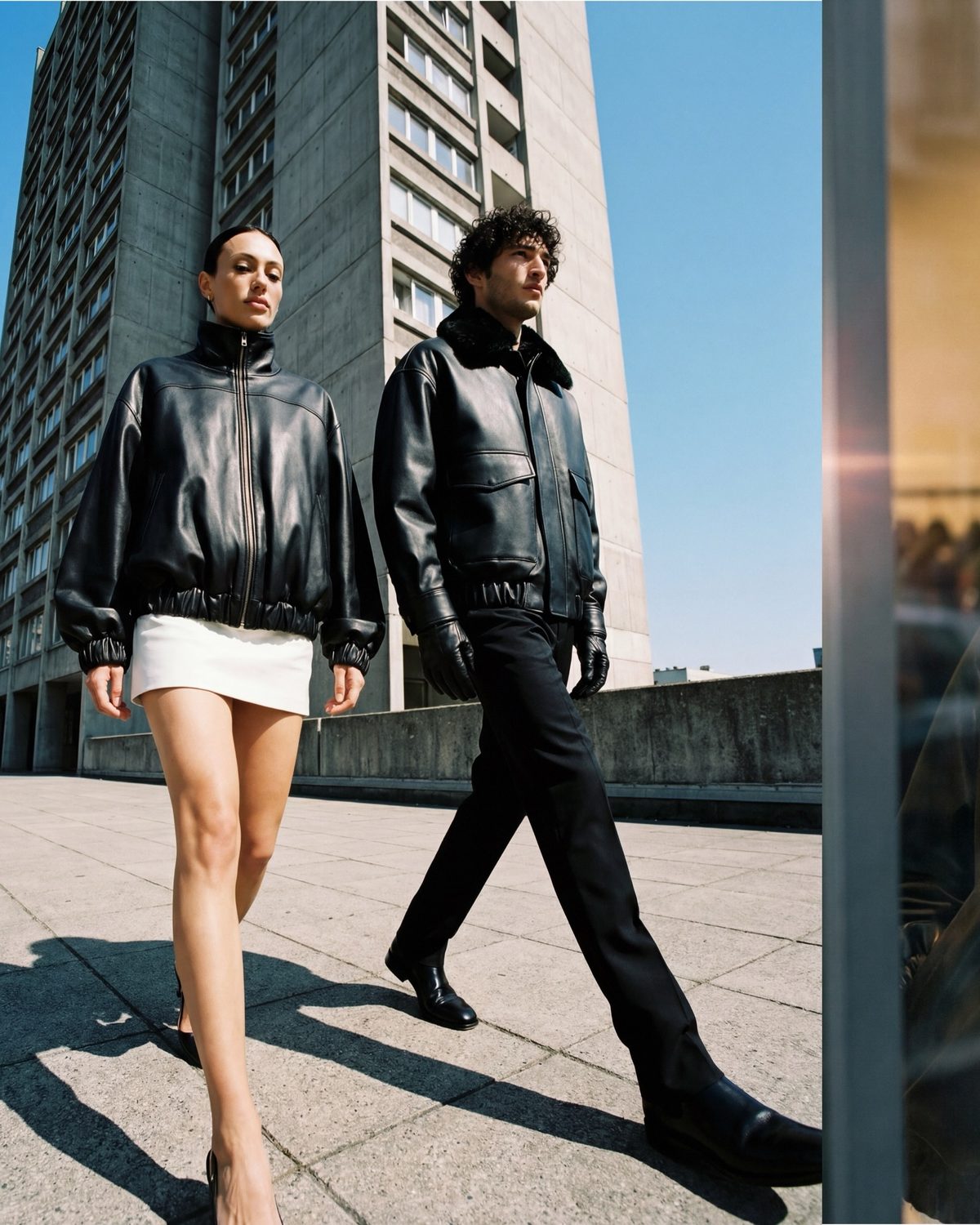 AI fashion photography — two models in leather outerwear, e-commerce editorial visual by Shotless Canada